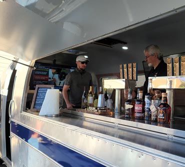 Long Island Beer and Burger Airstream serving window beer