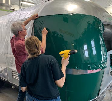 Putting body wrap on Airstream trailer