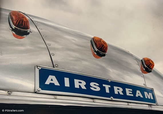Airstream name plate on top of trailer