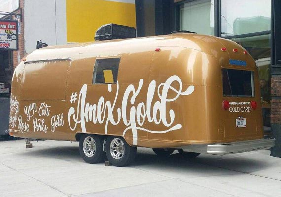 American Express Gold wrapped marketing trailer