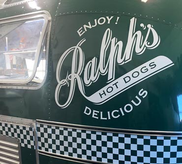 Ralph's Hot Dogs Airstream trailer wrap green