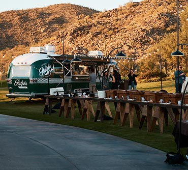 Ralph's Hot Dogs Airstream trailer at outdoor dinner event
