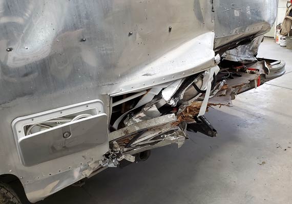 Airstream vs. BMW damaged back corner